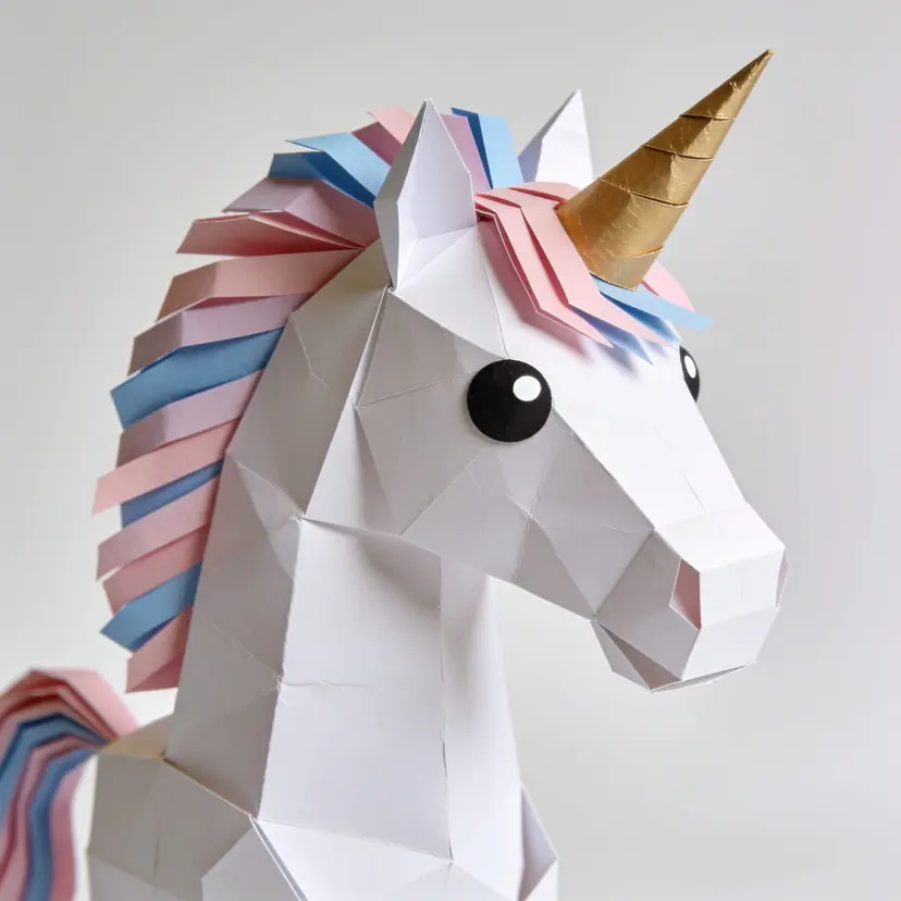 Papercraft-style unicorn head, low-poly folded paper with pastel mane and gold horn