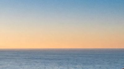 A sky crop with faint grain at low strength
