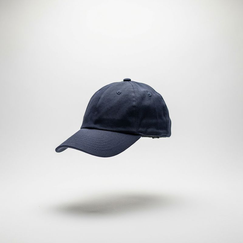 A navy wool baseball cap on white