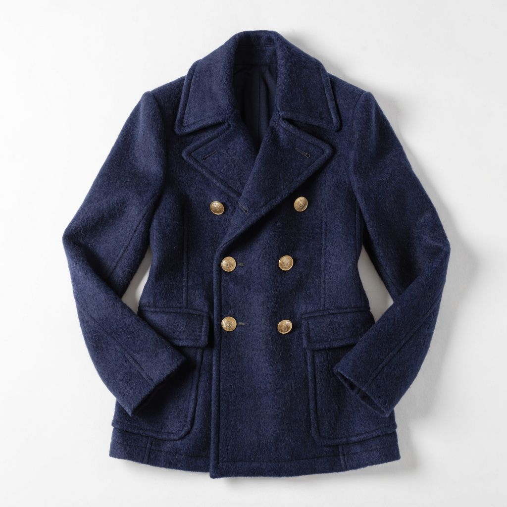 Flat-lay of the navy double-breasted peacoat