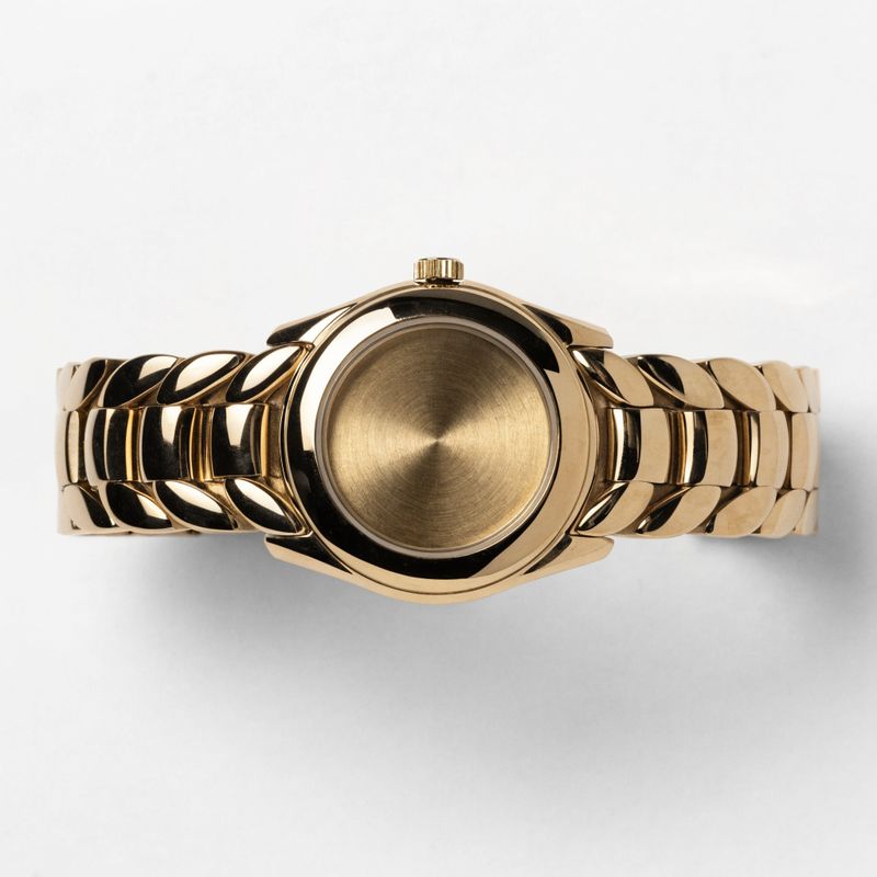 A large gold wristwatch