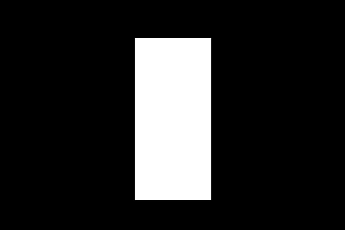 A black frame with a white rectangle covering the middle shirt along with some wall and the inner edges of the shirts either side of it