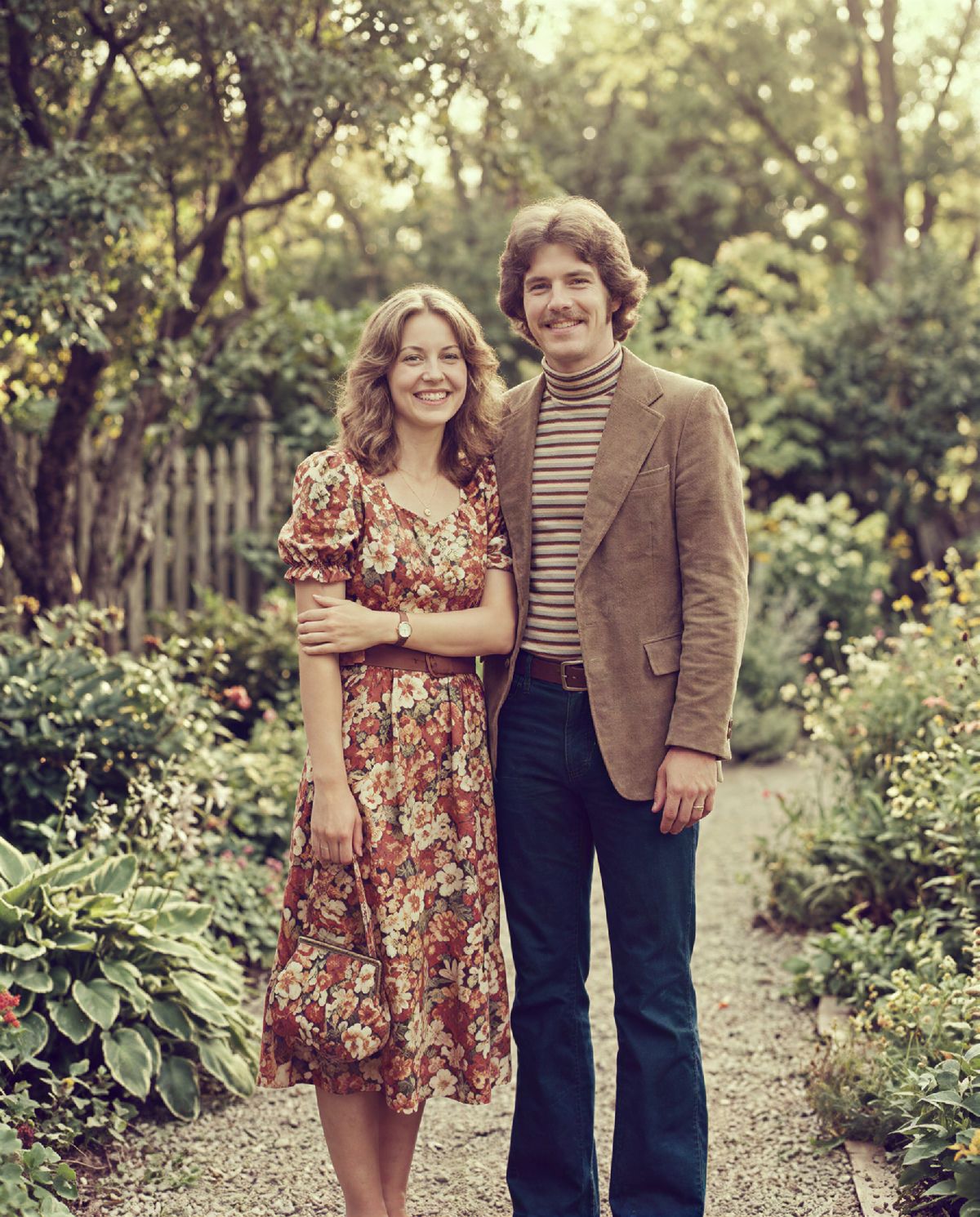 The same photo restored, with clear faces, recovered colour, and no visible grain