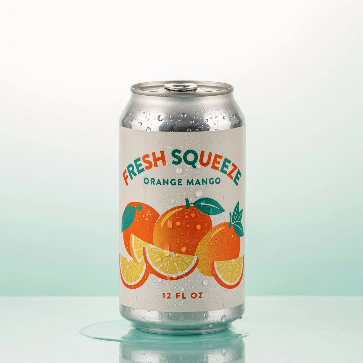 A clean designed aluminium juice can reading FRESH SQUEEZE ORANGE MANGO with an orange illustration