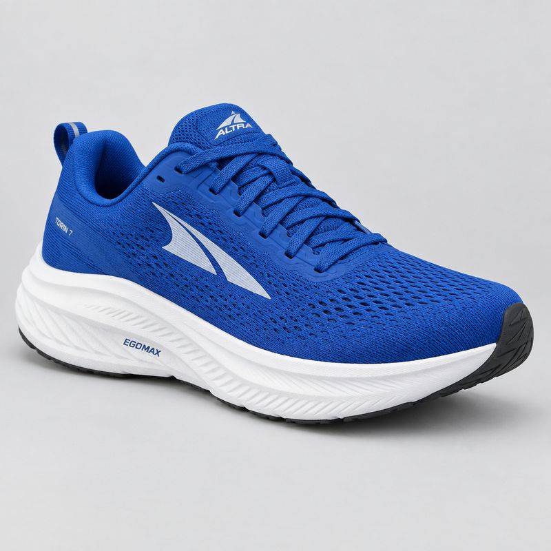 A cobalt blue road running shoe with a white foam midsole photographed in three-quarter view on a seamless light grey background