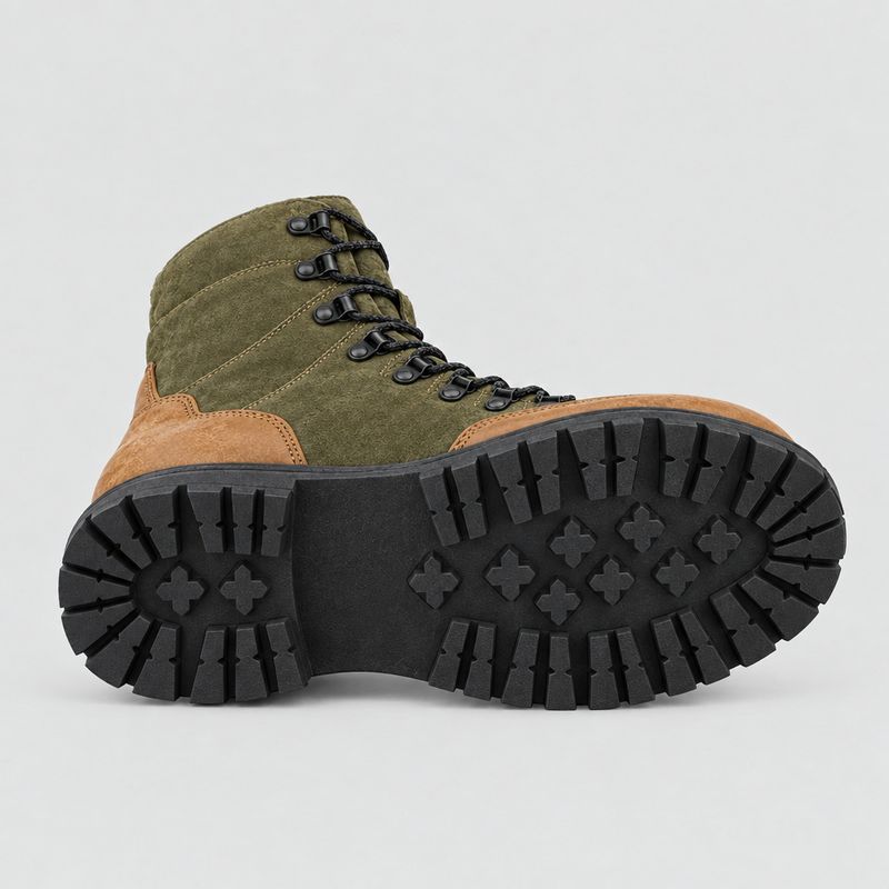 The same hiking boot tilted to show its black lug sole pattern