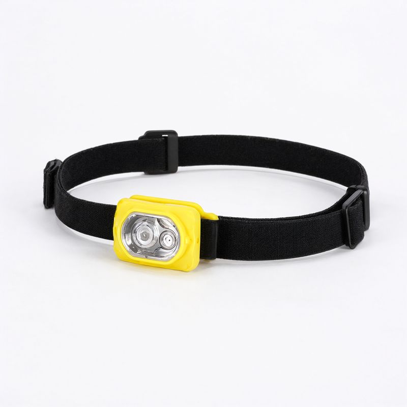 A headlamp with a yellow housing and a looped black strap on white
