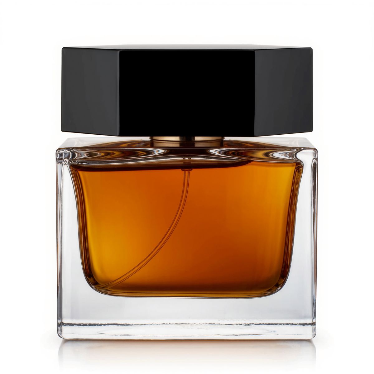 A square glass perfume bottle with amber liquid and a heavy black cap on white