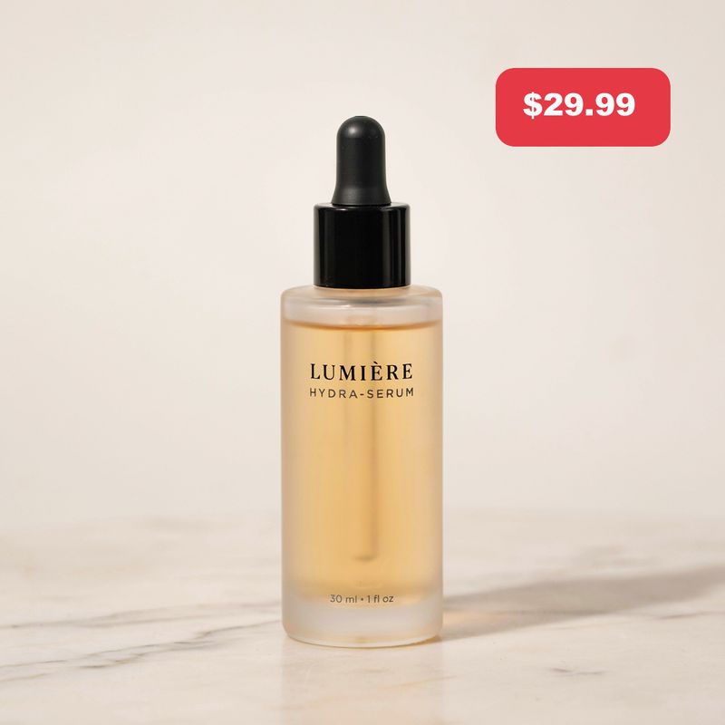 A skincare serum bottle on marble with a red $29.99 price sticker in the top corner