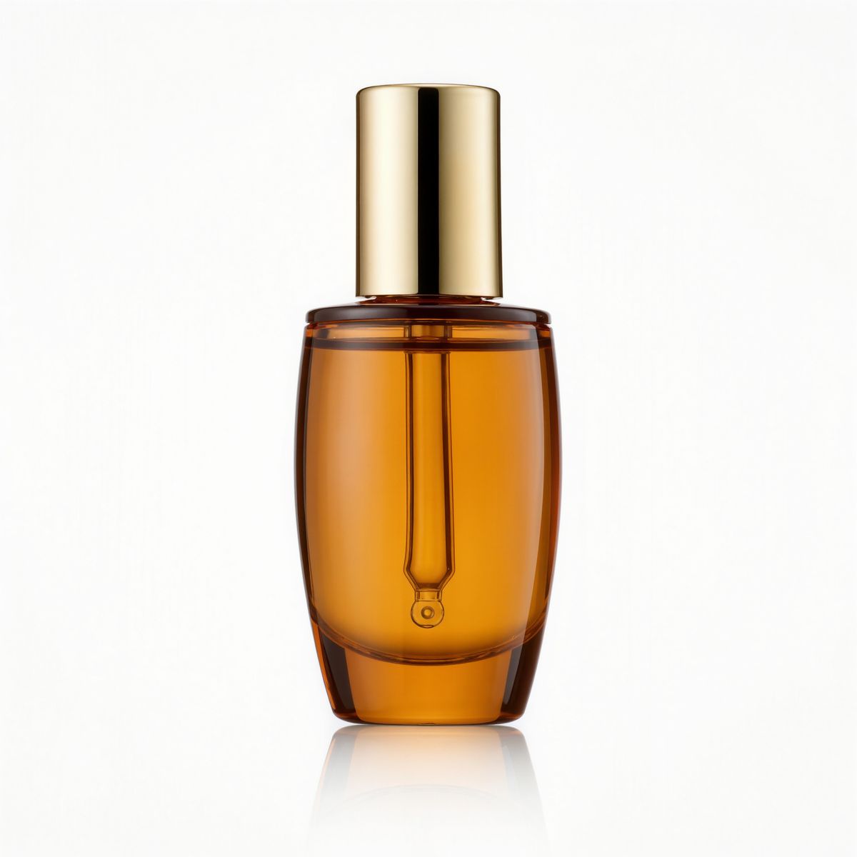 An oval amber glass serum bottle with a gold dropper cap on white